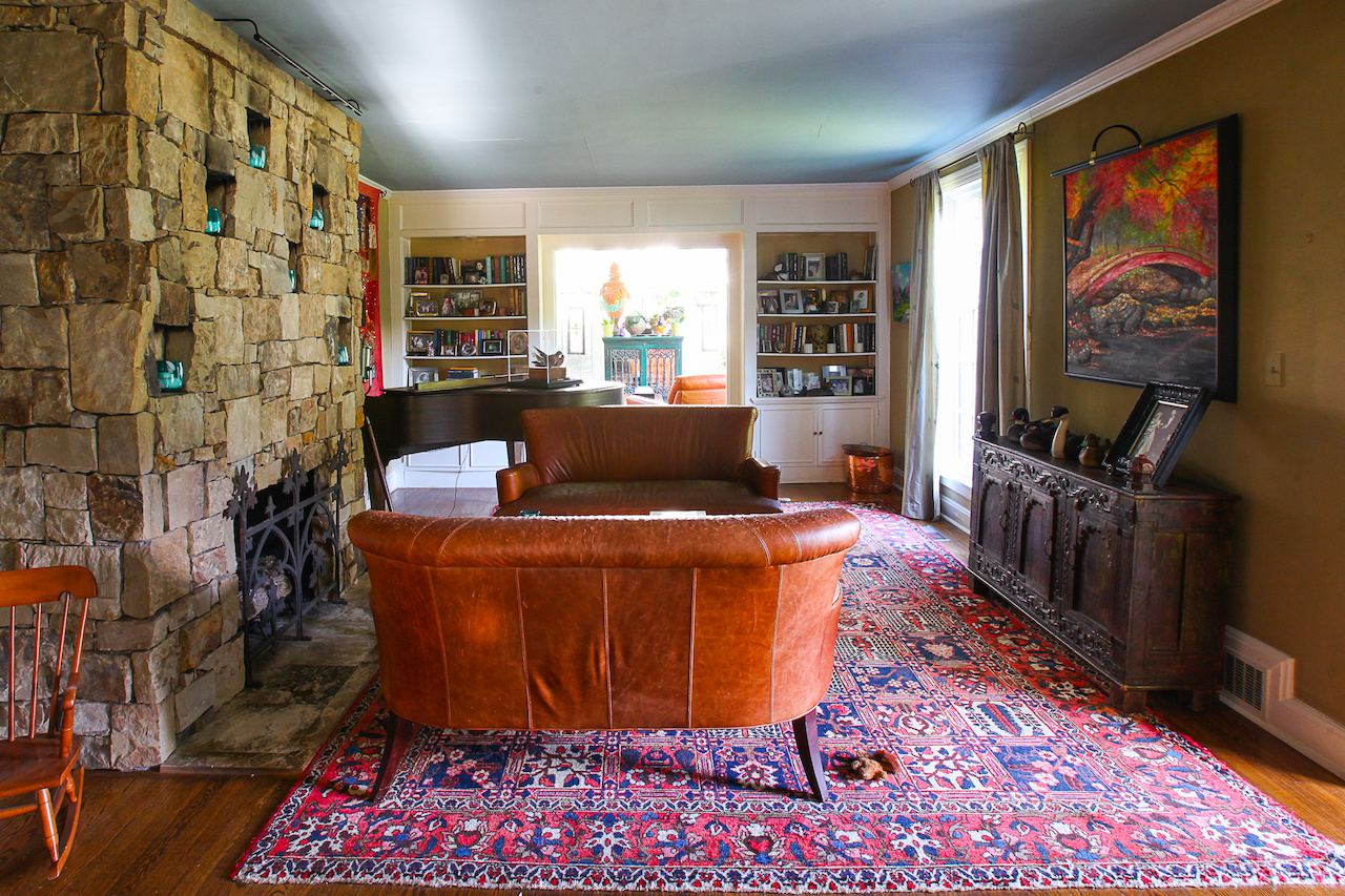The stone fireplace is the focal point of the room.