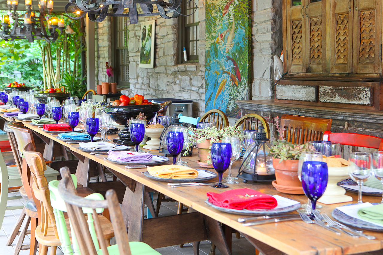 The outdoor table is set for the expected 34 guests!