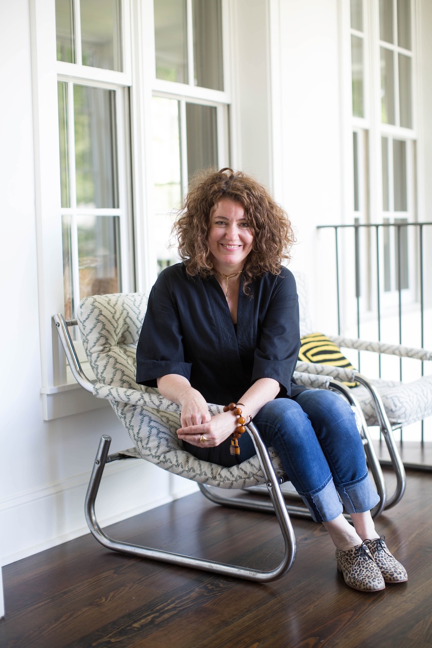 Rachel Gray sits in a sling chair she found in France, and recovered here in Memphis. Rachel Gray sits in a sling chair she found in France, and recovered here in Memphis.