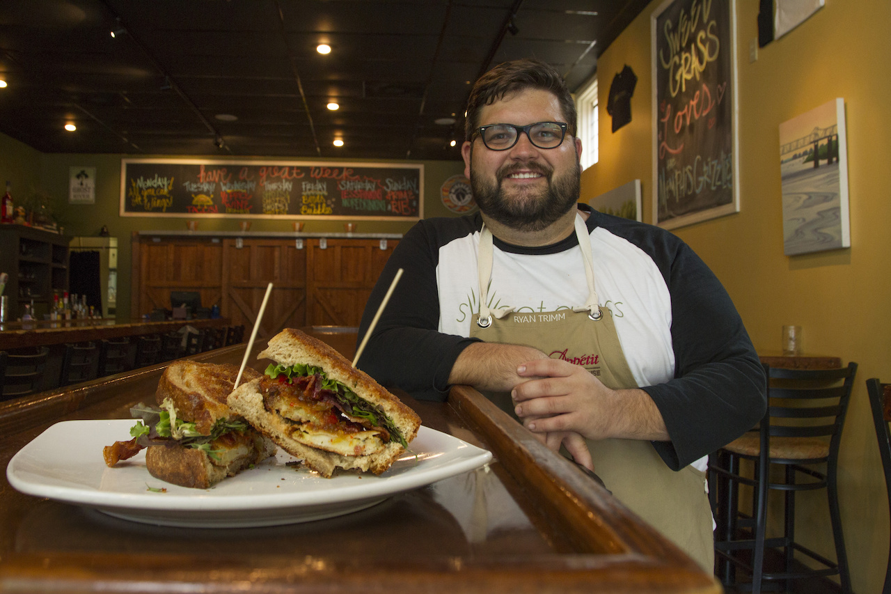 Chef Ryan Trimm and his mouthwatering Fried Green Tomato BLT, found on the menu at Next Door. Chef Ryan Trimm and his mouthwatering Fried Green Tomato BLT, found on the menu at Next Door.