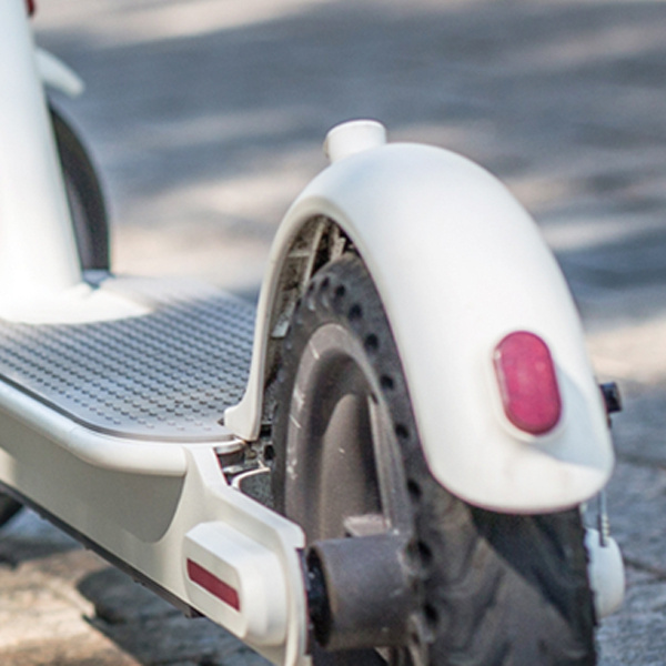 closeup of scooter wheel