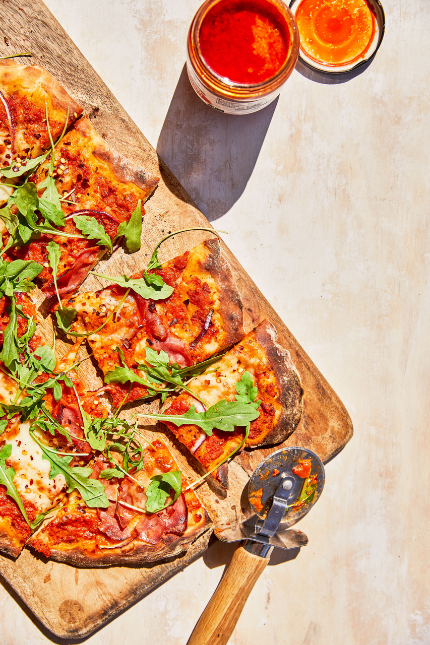 Spanish Romesco Flatbread with Mozzarella, Arugula, and Prosciutto