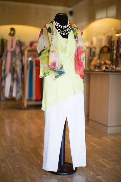 From Coming Attractions: 3/4 sleeve draped asymmetrical top in kiwi, $118; Crazy Larry pull-on pans $123;floral Tolani Challis scarf, $145 and multi-strand black and white necklace, $72 From Coming Attractions: 3/4 sleeve draped asymmetrical top in kiwi, $118; Crazy Larry pull-on pans $123;floral Tolani Challis scarf, $145 and multi-strand black and white necklace, $72