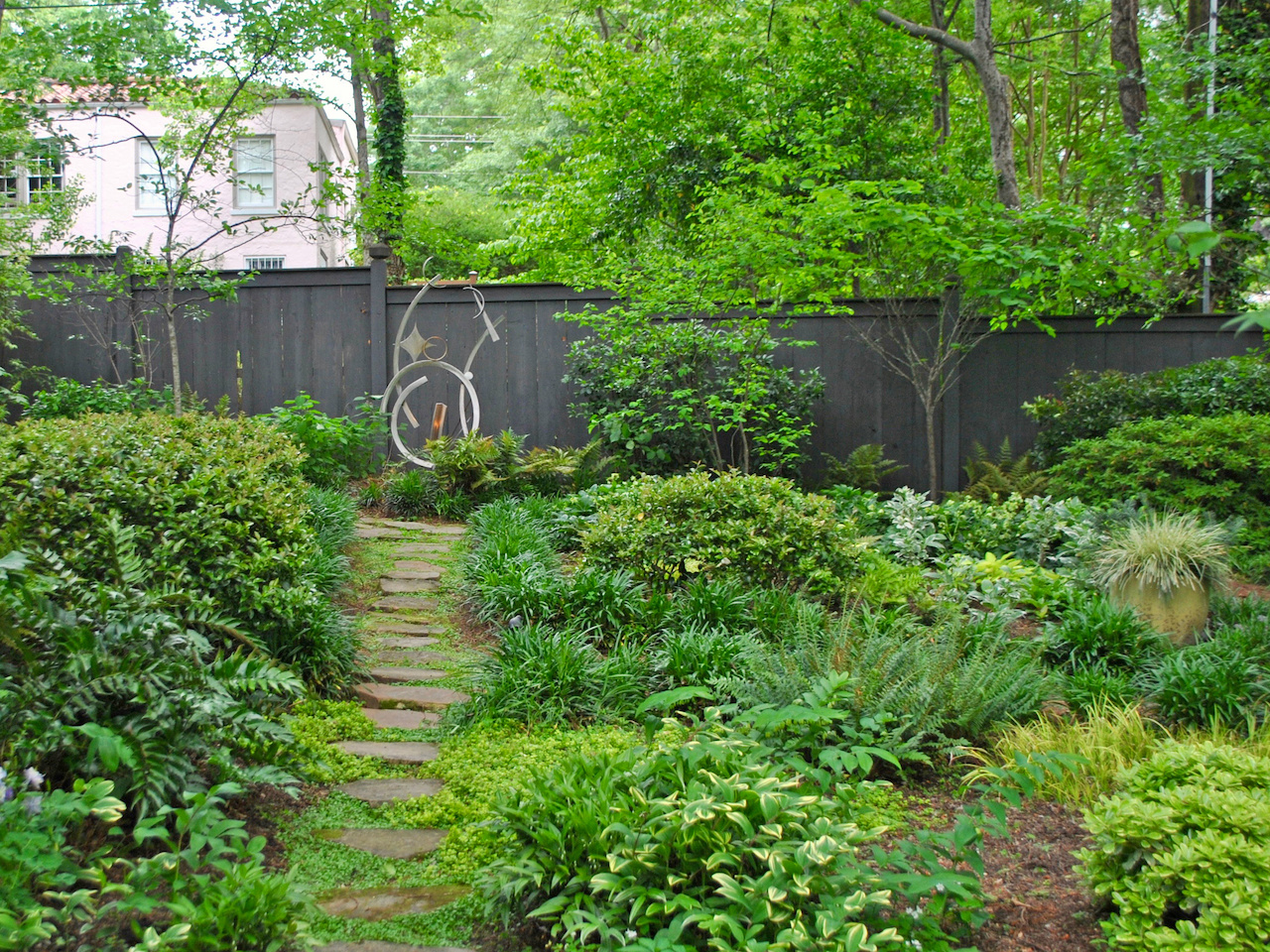 The garden sculpture by Dr. Dave Ullrich is titled "Offspring" and was commissioned for their 25th Anniversary. The garden sculpture by Dr. Dave Ullrich is titled "Offspring" and was commissioned for their 25th Anniversary.