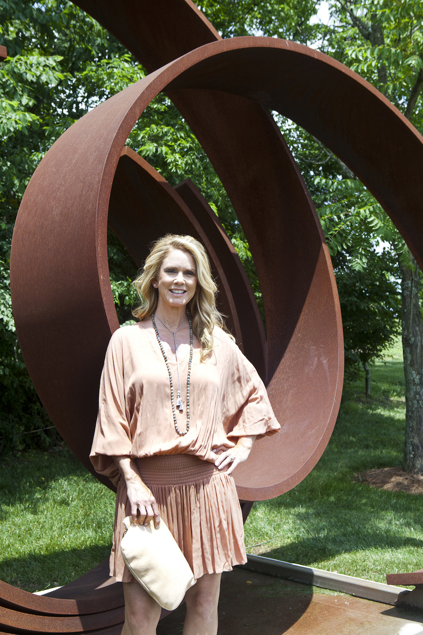 Arnita Ozgener for StyleBlueprint, wearing a $166 dress found at Hemline.