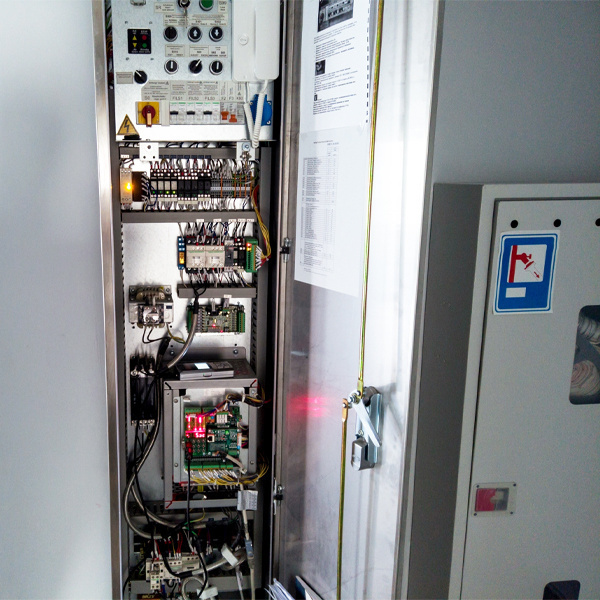 A sheet pasted inside of the door for a control panel lists which components control or protect which building electrical systems