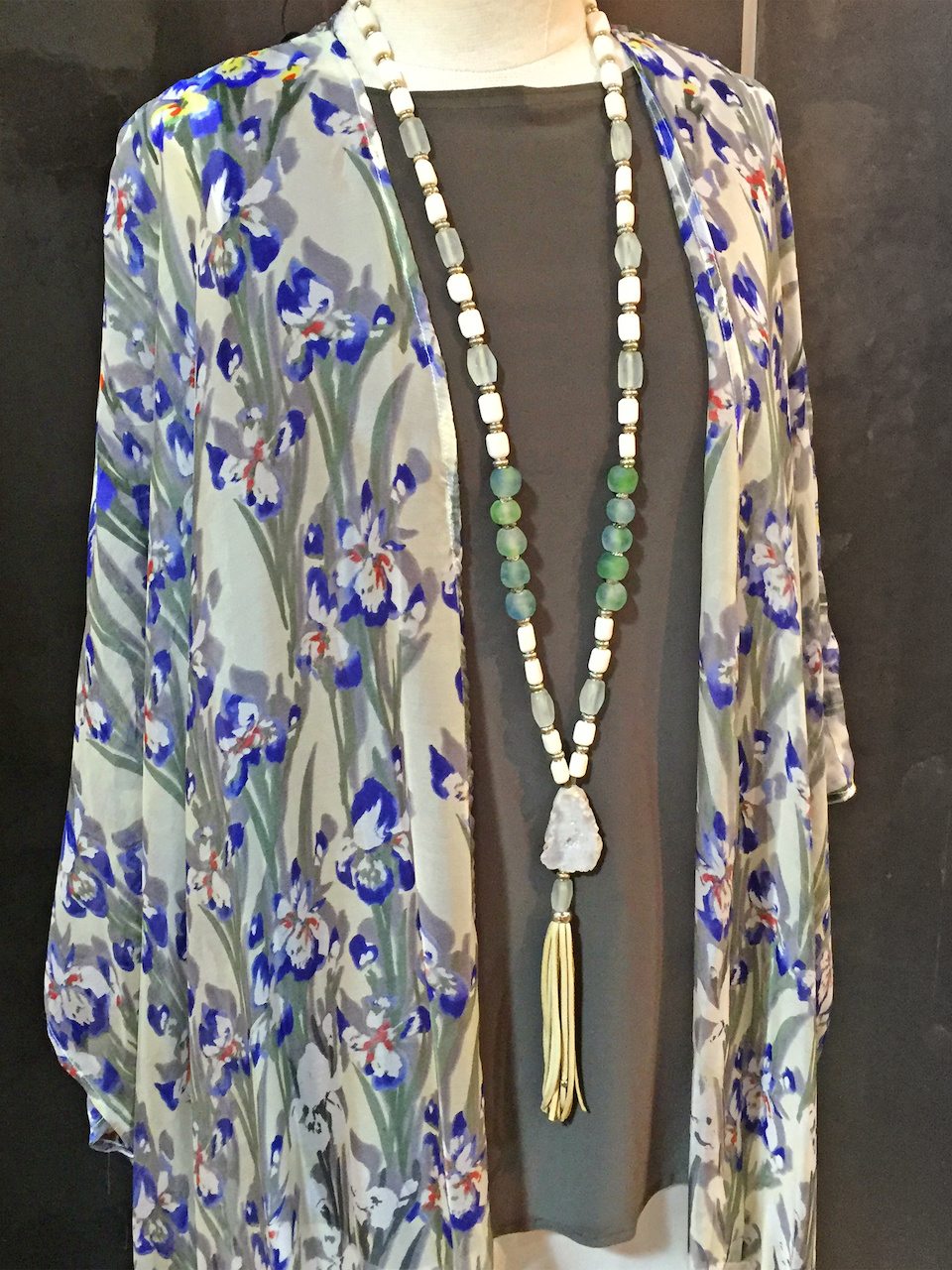 From Betsy Prince: white druzy agate pendant with carved bone beads and Ghana glass beads, $190 From Betsy Prince: white druzy agate pendant with carved bone beads and Ghana glass beads, $190