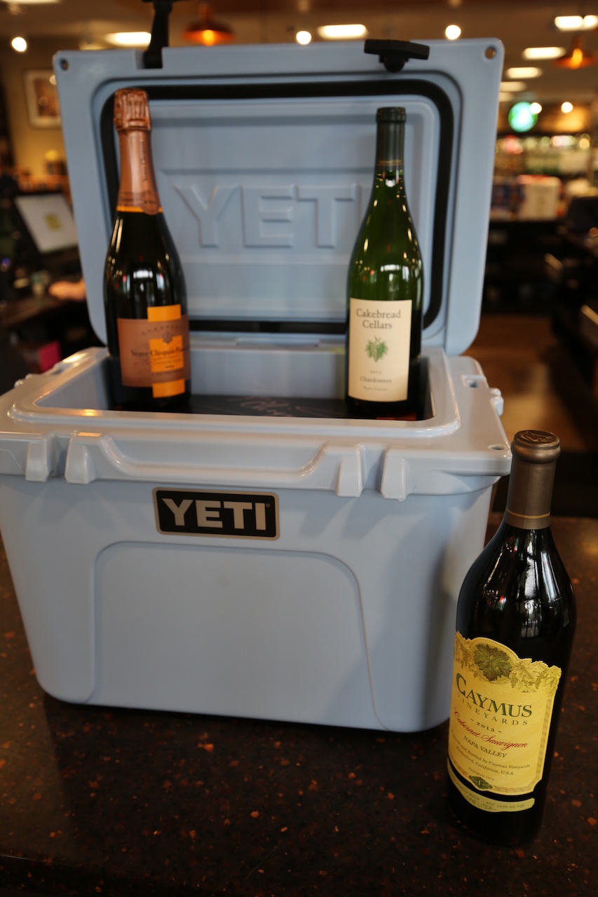 Yeti Roadie 20 cooler, $249.99; 2013 Cayman Cabernet Sauvignon, $84.99; 2013 Cakebread Chardonnay, $84.99 and a 2004 Veuve Clicquot Vintage Rose, $114.99, from Buster's Liquors and Wines. Yeti Roadie 20 cooler, $249.99; 2013 Cayman Cabernet Sauvignon, $84.99; 2013 Cakebread Chardonnay, $84.99 and a 2004 Veuve Clicquot Vintage Rose, $114.99, from Buster's Liquors and Wines.