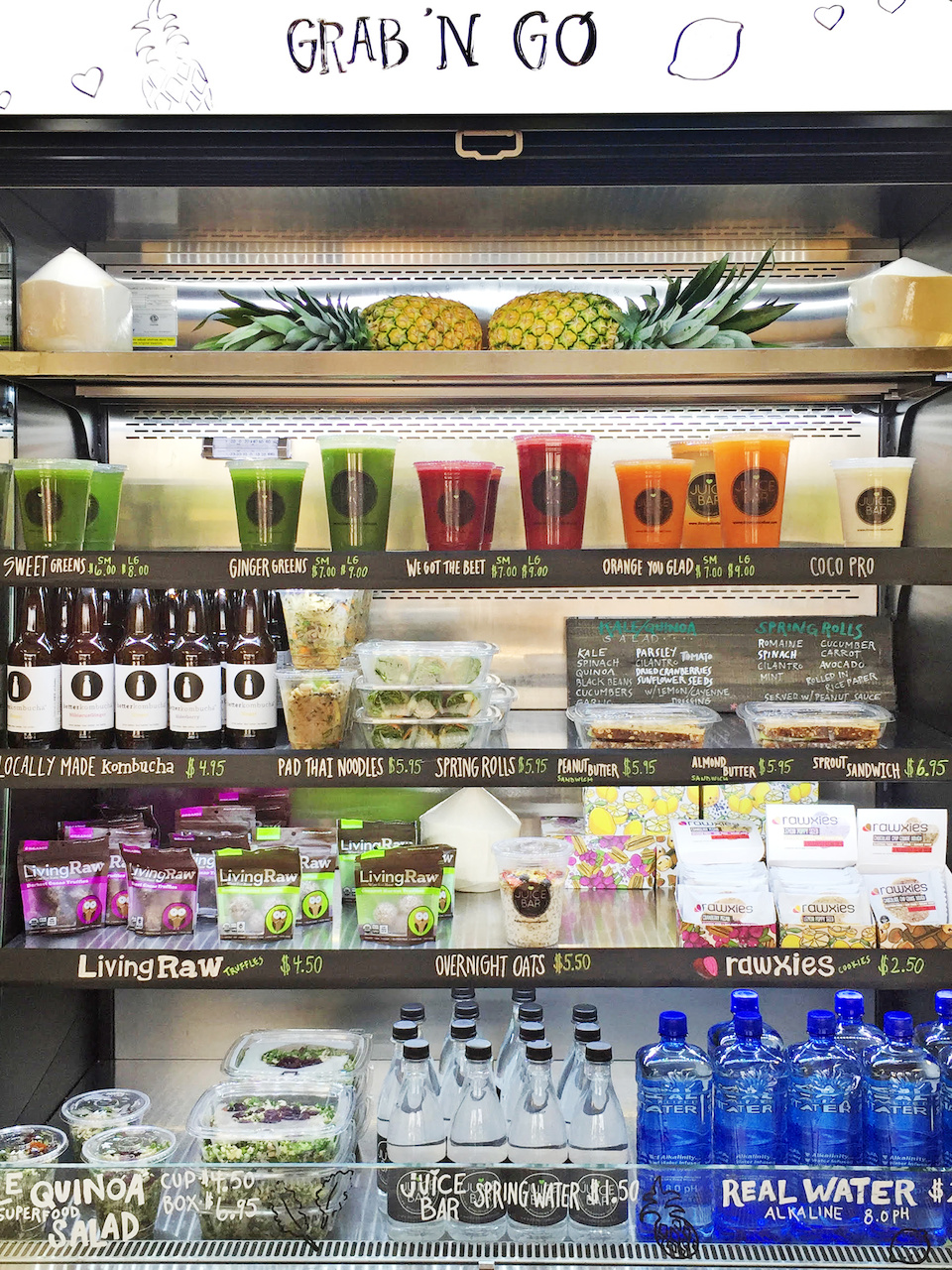 The grab 'n go cooler at Juice Bar offers a colorful array of healthy snacks and libations. The grab 'n go cooler at Juice Bar offers a colorful array of healthy snacks and libations.