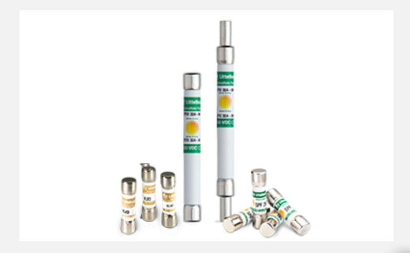 Assorted group of white and silver Littelfuse fuses