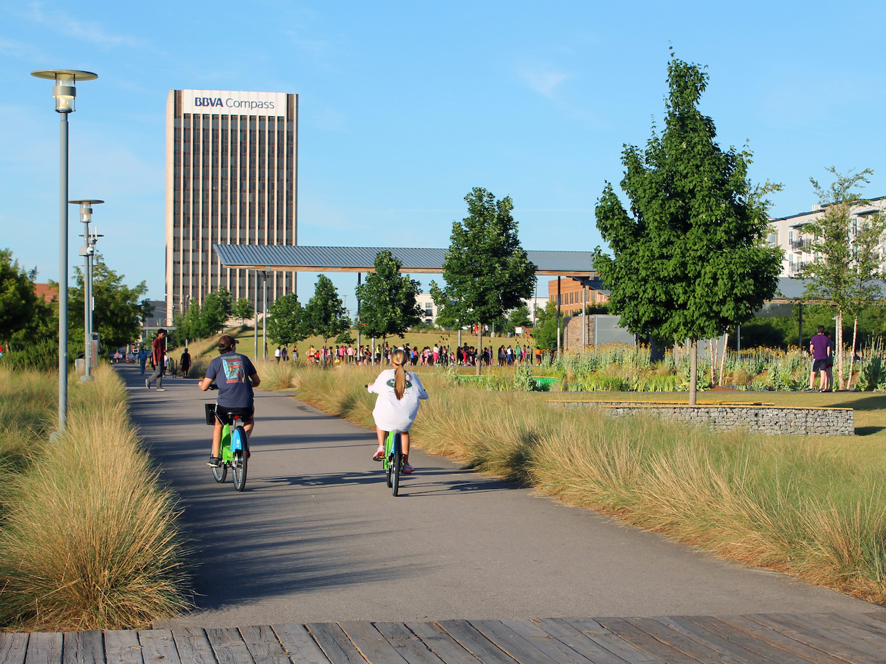 A couple explores the trails of Railroad Park on their Zyp bikeshare bikes. A couple explores the trails of Railroad Park on their Zyp bikeshare bikes.