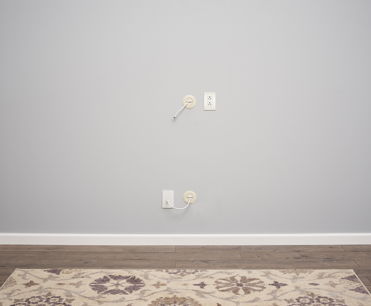 Residential wall with wall grommets supplying power