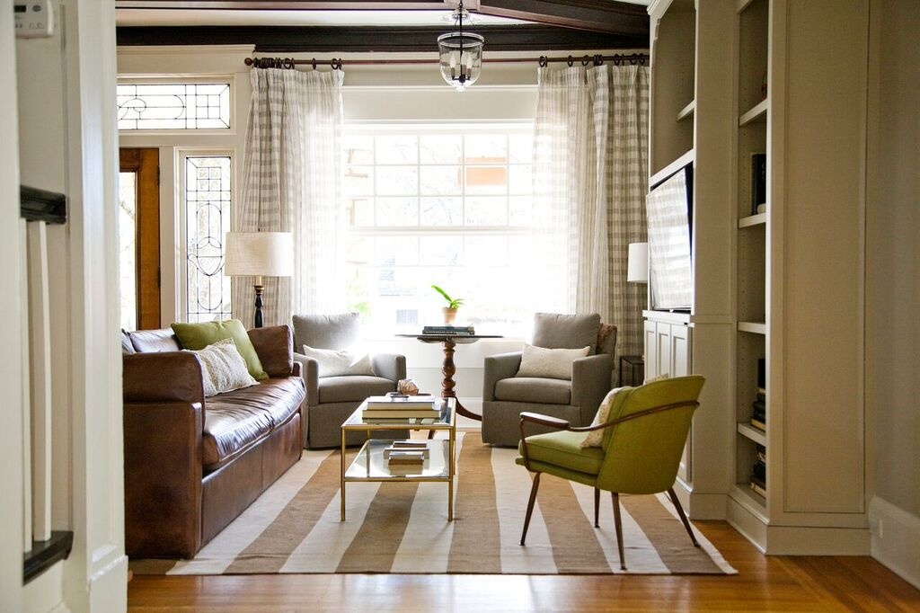 Large graphic elements like stripes modernize a room. Kate Hayes Midtown design