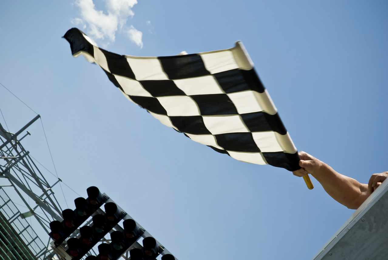 Waving checkered flag at Indianapolis Motor Speedway