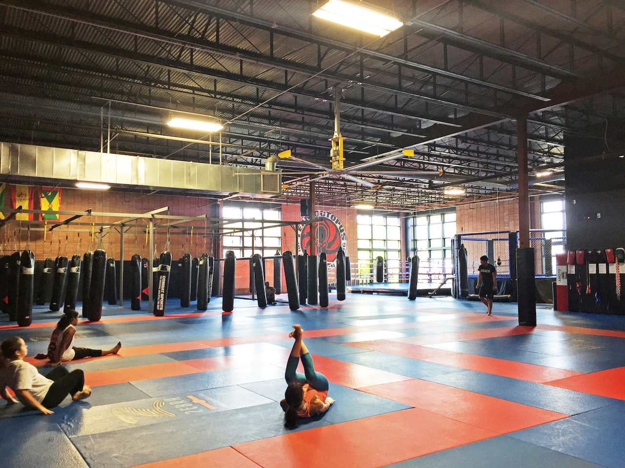 We're about to wail on those punching bags. ClassPass Team Octopus