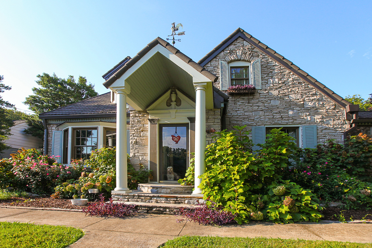 Johnny and Julie's storybook home greats you, often with a dog at the door!
