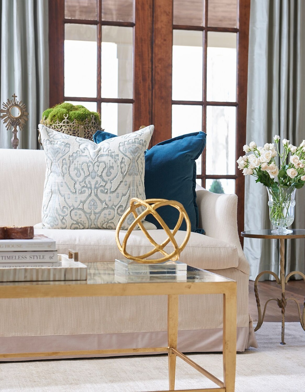A linen sofa from Lee Industries has a timeless silhouette; the designer can change out pillows to give the room a new look. A linen sofa from Lee Industries has a timeless silhouette; the designer can change out pillows to give the room a new look.