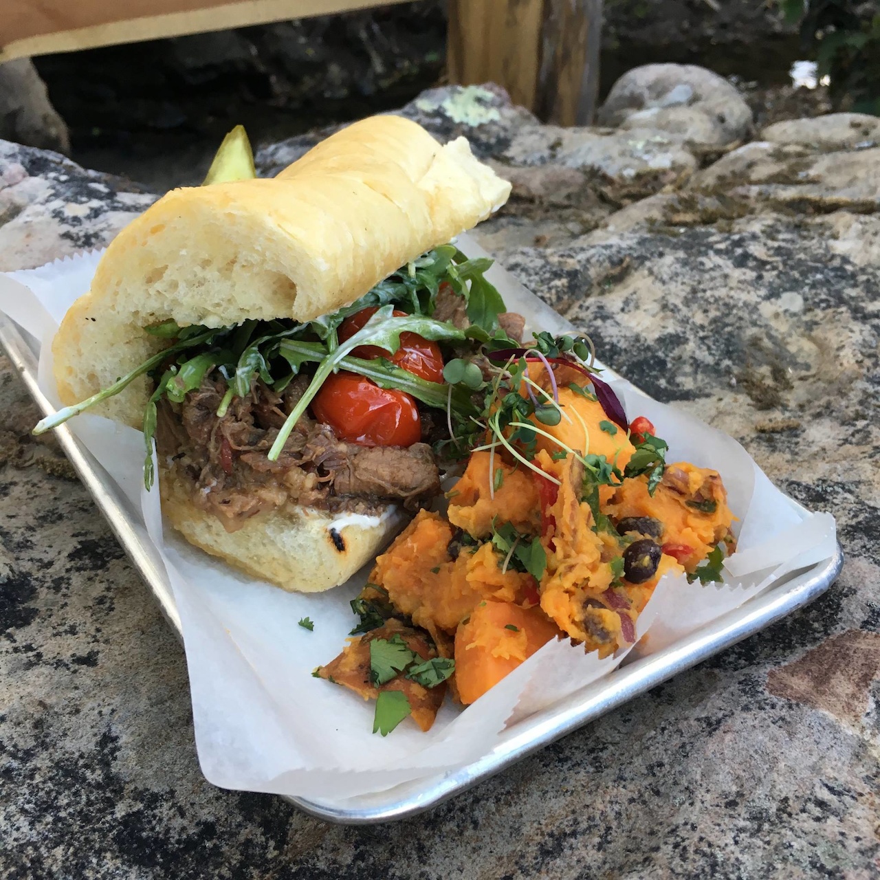 Loflin Yard became a fast favorite of many Memphians, not just those who live and work downtown, thanks to its backyard party atmosphere and excellent food _ including this po' boy. Image| Loflin Yard Facebook page Loflin Yard became a fast favorite of many Memphians, not just those who live and work downtown, thanks to its backyard party atmosphere and excellent food _ including this po' boy. Image| Loflin Yard Facebook page
