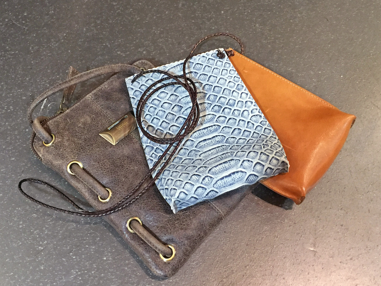From Betsy Prince: Latico leather crossbody bag, $117; B. May leather cell pouch bags, $120 From Betsy Prince: Latico leather crossbody bag, $117; B. May leather cell pouch bags, $120