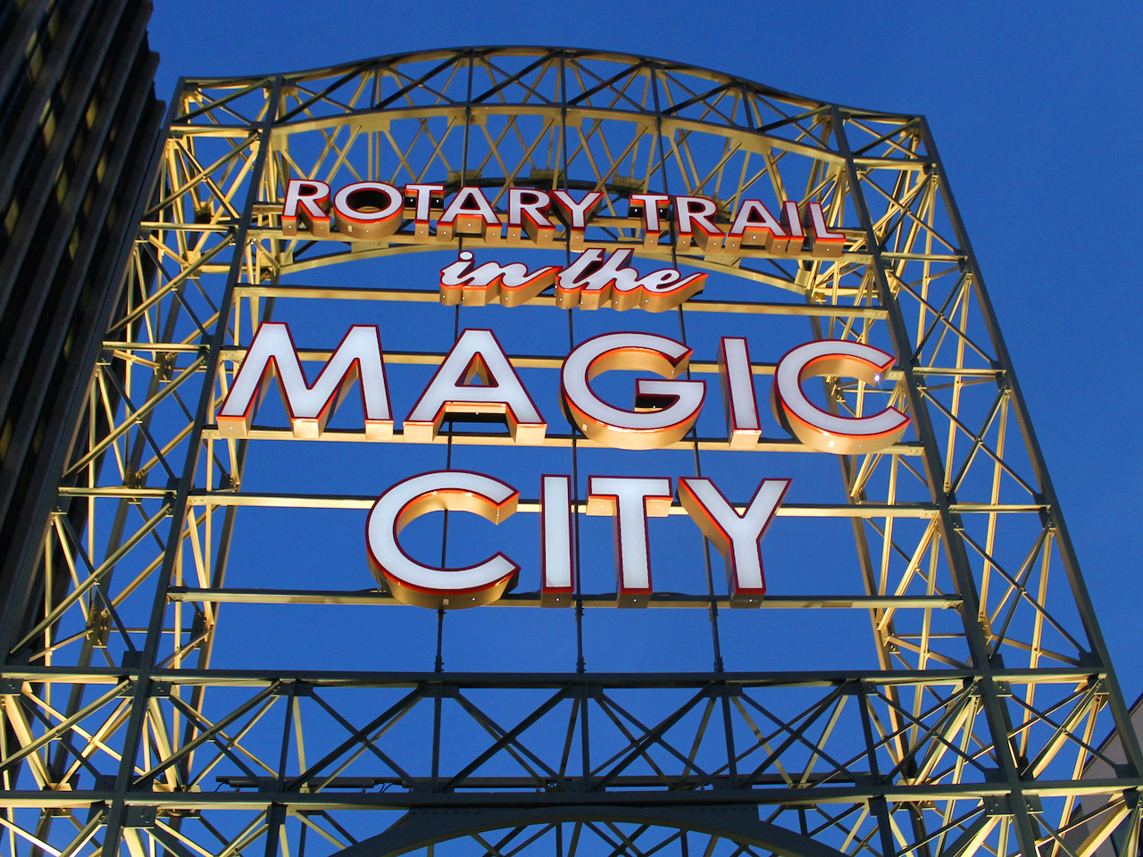 A closeup of the gateway entrance to the Rotary Trail lit up at night A closeup of the gateway entrance to the Rotary Trail lit up at night