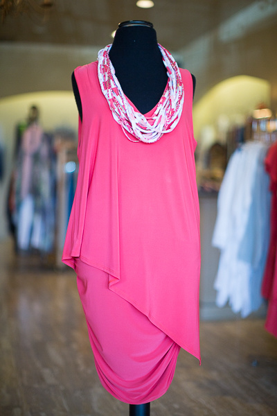 From Coming Attractions: Clare Sunwoo asymmetrical V-neck dress in geranium, $147; Shreds multistrand fabric necklace, $42 From Coming Attractions: Clare Sunwoo asymmetrical V-neck dress in geranium, $147; Shreds multistrand fabric necklace, $42