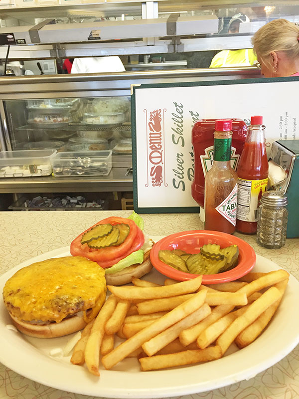 Don't forget the extra pickles! Traditional Southern restaurants aren't known for their vegetarian-friendly options, but The Silver Skillet does serve a killer veggie burger smothered in cheese.