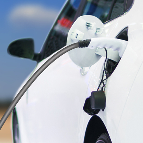 Emobility_passenger vehicles_baseball card image_L2_charger charging white car