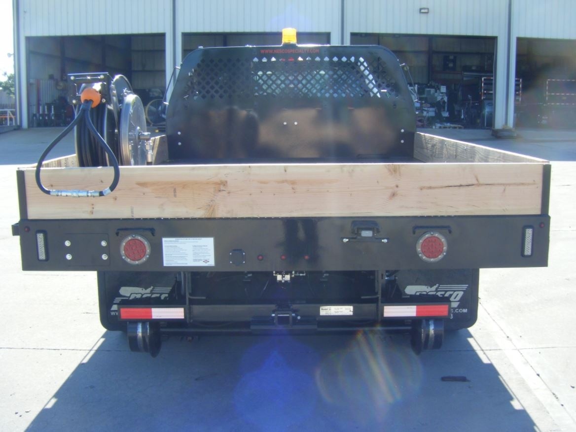 MediumDuty HiRail Flatbed Truck Rental Custom Truck One Source