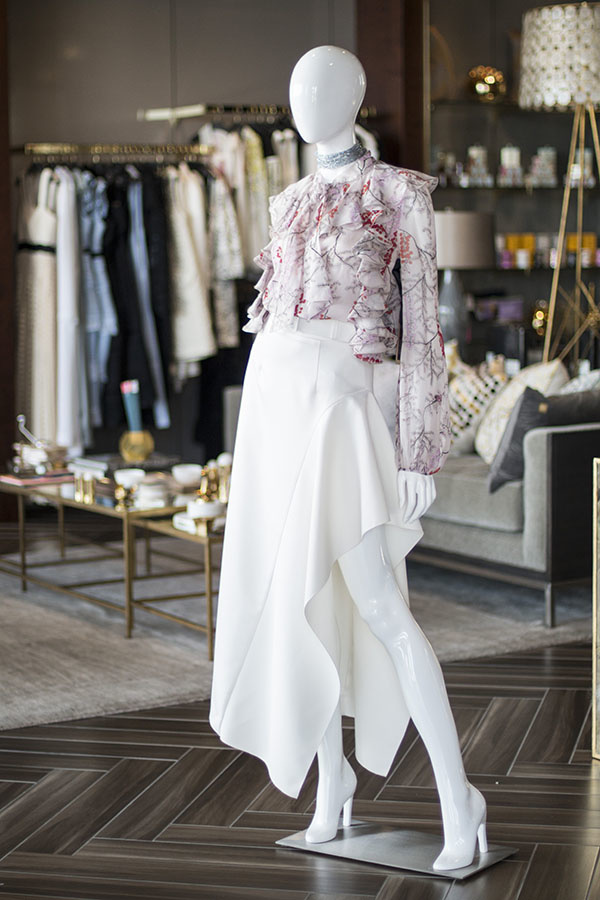 From 20twelve: Cherry blossom top by Giambattista Valli, $1,965; Kaya Midi skirt by Solace London, $520; ARox necklace, $248 From 20twelve: Cherry blossom top by Giambattista Valli, $1,965; Kaya Midi skirt by Solace London, $520; ARox necklace, $248
