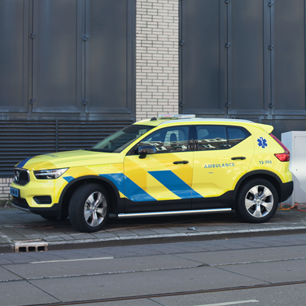Specialty Vehicle - yellow and blue ambulance
