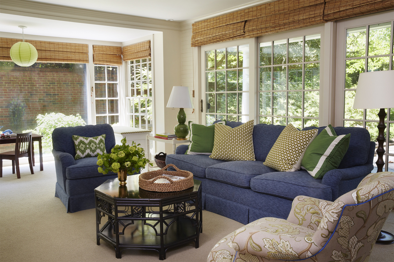 “This family room is where everyone hangs out to watch TV,” says the designer, “So it needed to be comfortable and durable. I love navy blue upholstery as a durable alternative to beige and grey. These Charles Stewart sofas are upholstered in Duralee fabric with Schumacher throw pillows.” “This family room is where everyone hangs out to watch TV,” says the designer, “So it needed to be comfortable and durable. I love navy blue upholstery as a durable alternative to beige and grey. These Charles Stewart sofas are upholstered in Duralee fabric with Schumacher throw pillows.”