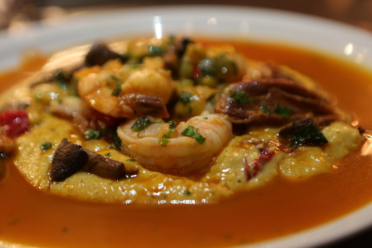 Shrimp and pimento cheese grits bathed in a New Orleans BBQ sauce Shrimp and pimento cheese grits bathed in a New Orleans BBQ sauce