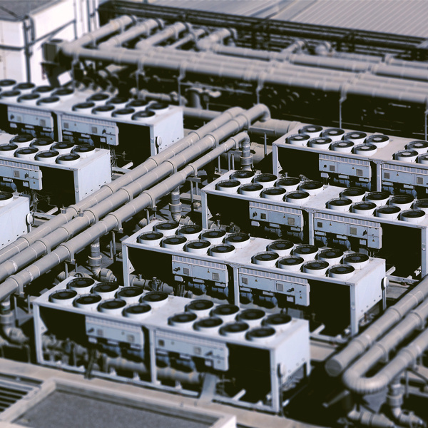 A smart thermostat hangs on the wall outside an office break room