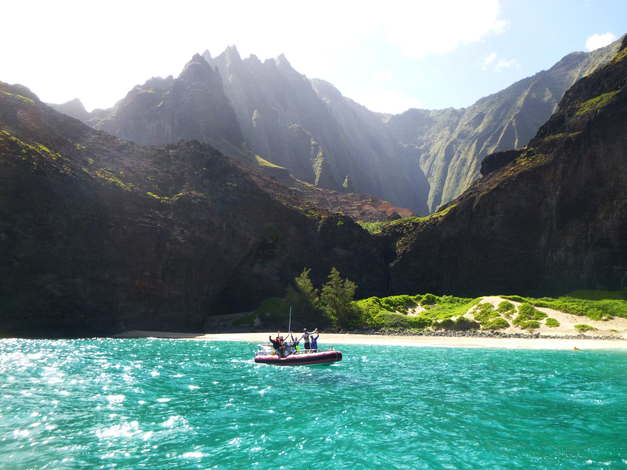Today was a very special day on the water — we surveyed the reefs around the Nā Pali Coast. We find mostly rocks and boulders below the water's surface. Fishes enjoy the shelter of the boulders, while small coral colonies grow and claim their space on top of the boulders. The Nā Pali Coast can endure some harsh winters with major swells, but it is much calmber in the summer. Photo: NOAA Fisheries/Mia Lamarind