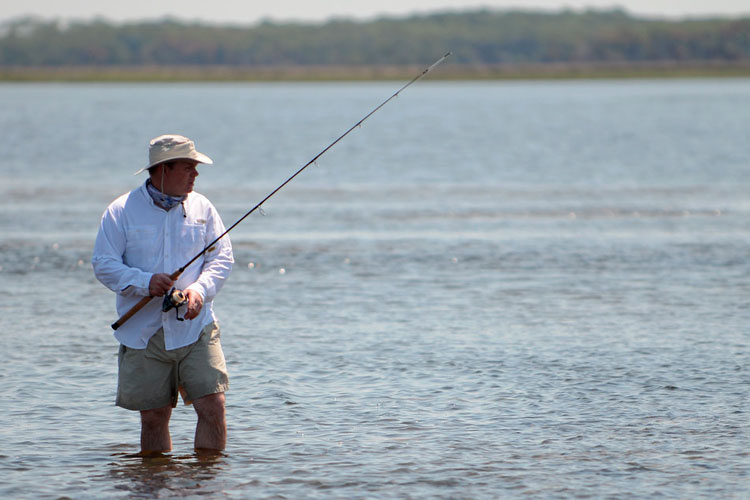 An angler fishes off the Gulf coast of Florida. An angler fishes off the Gulf coast of Florida.