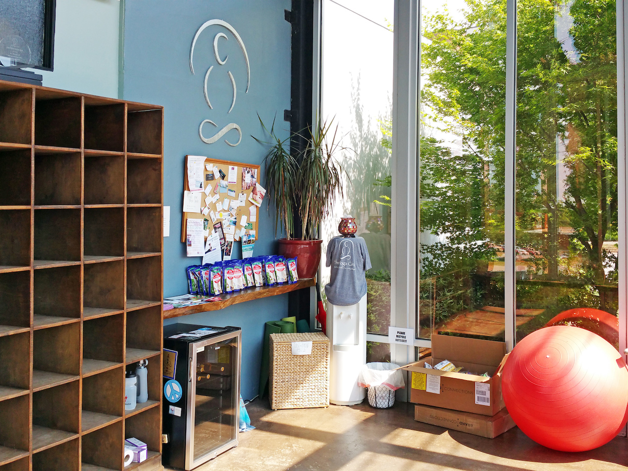 The large, airy sunroom studio at The Yoga Circle has cubbies, water and energy snacks, as well as an exercise ball and weights. The large, airy sunroom studio at The Yoga Circle has cubbies, water and energy snacks, as well as an exercise ball and weights.