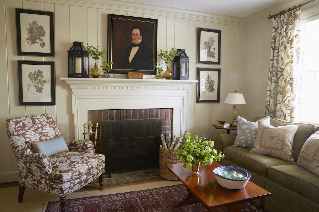 Family antiques fill the study, a favorite place for adults to retreat in the evening. Painting the bookcases, fireplace mantle and walls in a creamy beige warmed up the room without making it too dark and moody, adds Hennessy. The color was chosen from the crewel curtains that the previous owners left behind. Family antiques fill the study, a favorite place for adults to retreat in the evening. Painting the bookcases, fireplace mantle and walls in a creamy beige warmed up the room without making it too dark and moody, adds Hennessy. The color was chosen from the crewel curtains that the previous owners left behind.