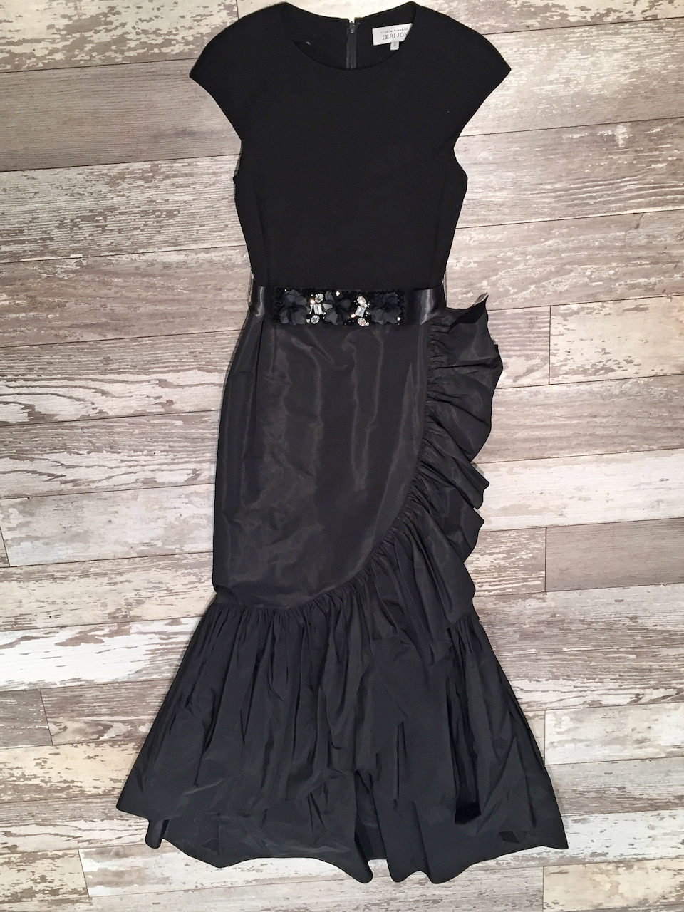 From The Clothes Tree: Teri Jon by Rickie Freeman black jersey & taffeta gown, $750 From The Clothes Tree: Teri Jon by Rickie Freeman black jersey & taffeta gown, $750