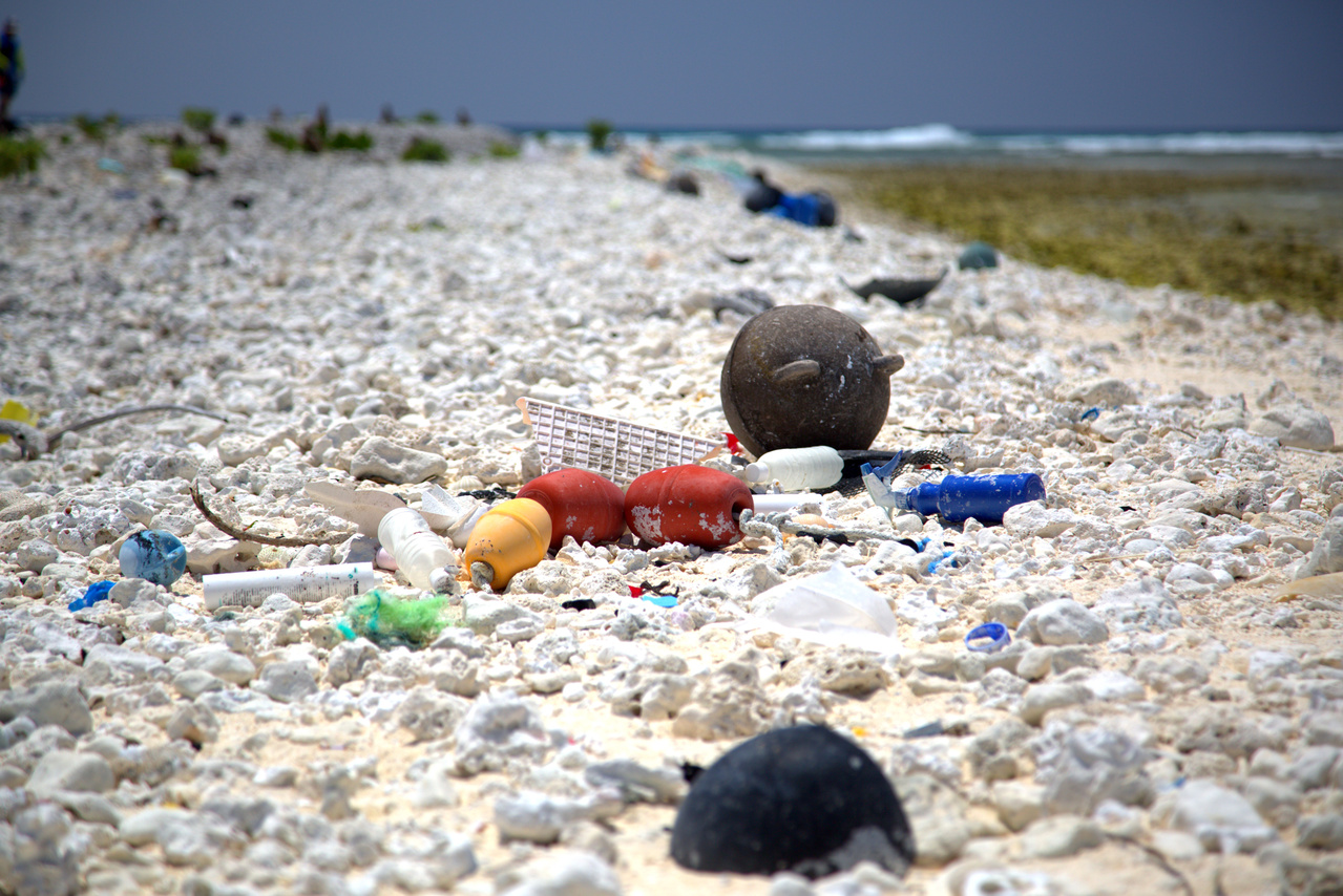 On April 21, 2016, the team moved operations from Eastern Island to Spit Island, the smallest of the three islands of Midway Atoll. Here they continued their efforts of surveying and cleaning the debris from the shoreline. Photo: NOAA Fisheries/Ryan Tabata