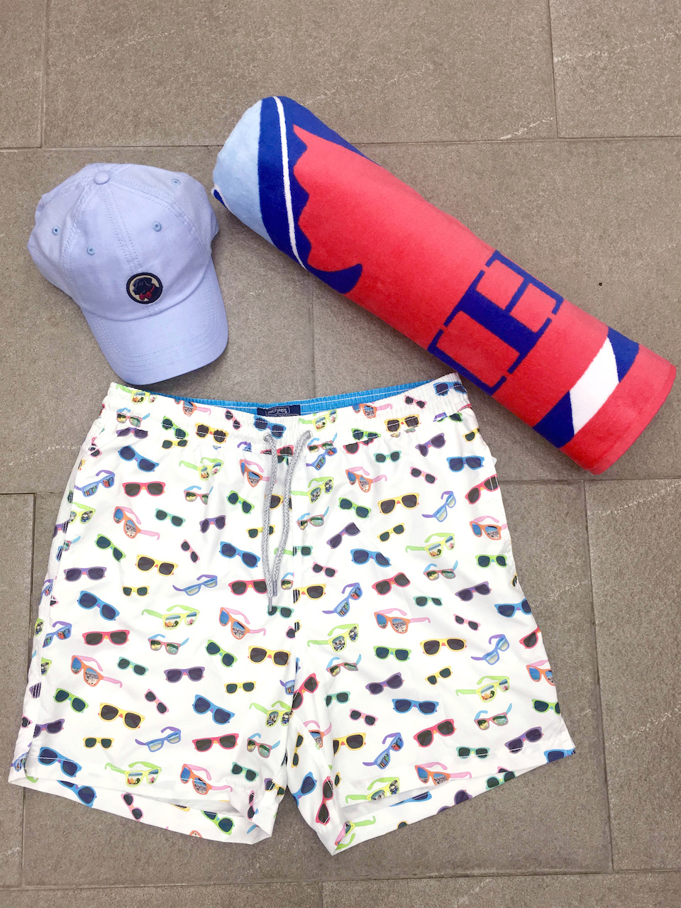 From Remon’s: Michael's sunglasses print bathing suit, $98.50; Southern Tide towel, $49.50; Southern Proper hat, $28 From Remon’s: Michael's sunglasses print bathing suit, $98.50; Southern Tide towel, $49.50; Southern Proper hat, $28