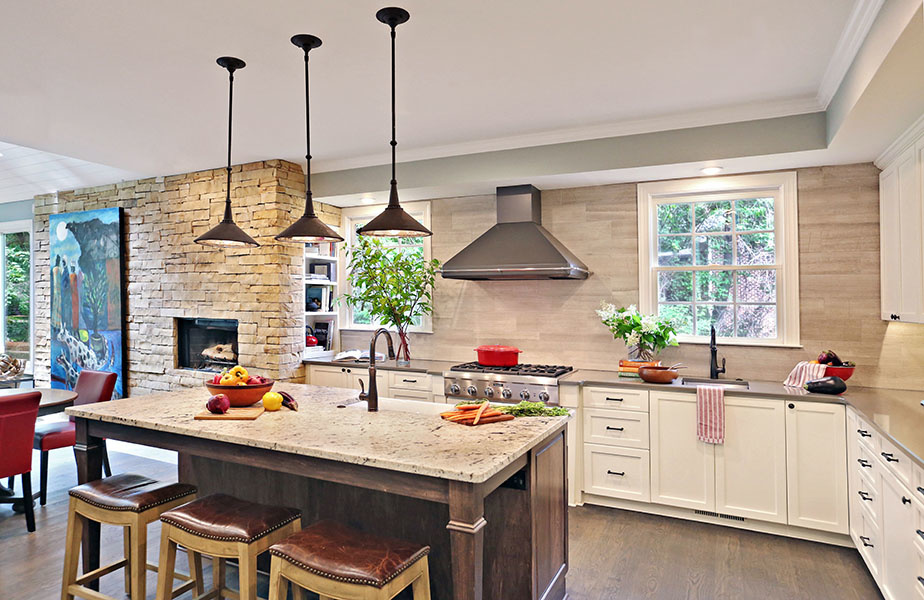 The hood not only has a utilitarian purpose, but also adds to the design of the space. StyleBlueprint Atlanta: chef's kitchen