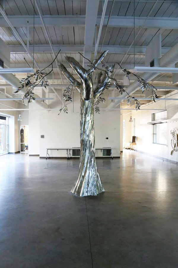 What a wonderful way to create drama in an industrial space. Trees Atlanta Kendeda Center