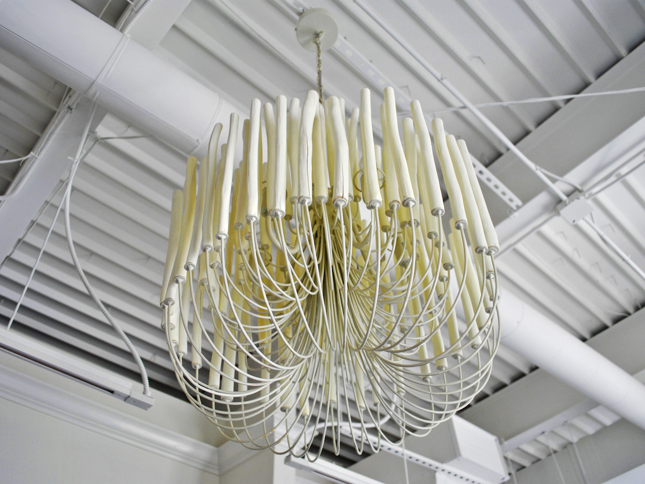 This chandelier of white-washed driftwood is stunning, especially alight in the evenings! This chandelier of white-washed driftwood is stunning, especially alight in the evenings!