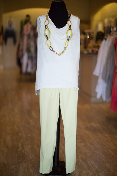 From Coming Attractions: Long white layering tank, $58; Bobeau white fishnet knit cotton sleeveless top, $80; Peache of Cloth straight leg, front-zip pants in margarita; lucite link necklace, $90. From Coming Attractions: Long white layering tank, $58; Bobeau white fishnet knit cotton sleeveless top, $80; Peache of Cloth straight leg, front-zip pants in margarita; lucite link necklace, $90.