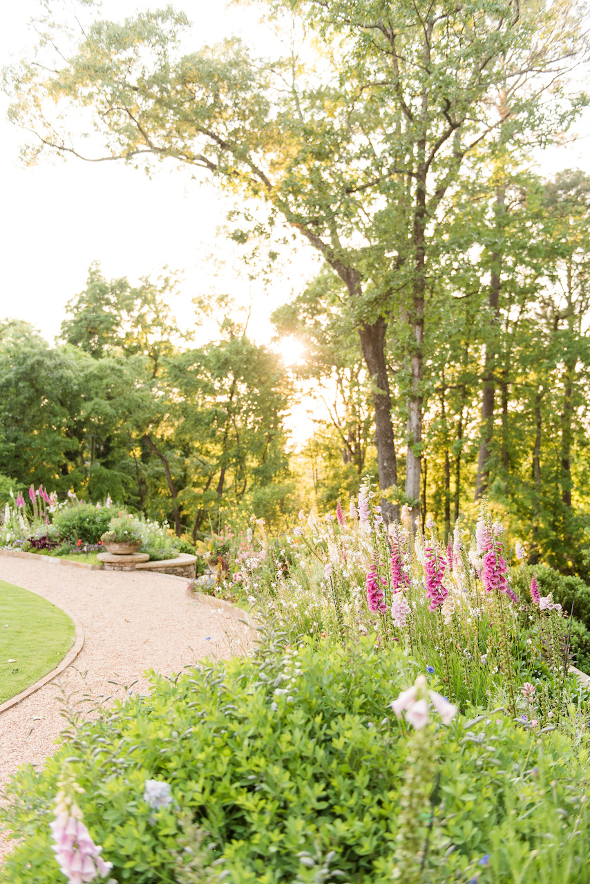 "Several ideas were proposed for the rear garden area in the initial phases that ultimately concluded with the sweeping curved retaining wall, allowing for a large open space off the main body of the house," says John Wilson of Golightly Landscape Architecture. "So, it worked well to have the flower border following the wall." "Several ideas were proposed for the rear garden area in the initial phases that ultimately concluded with the sweeping curved retaining wall, allowing for a large open space off the main body of the house," says John Wilson of Golightly Landscape Architecture. "So, it worked well to have the flower border following the wall."