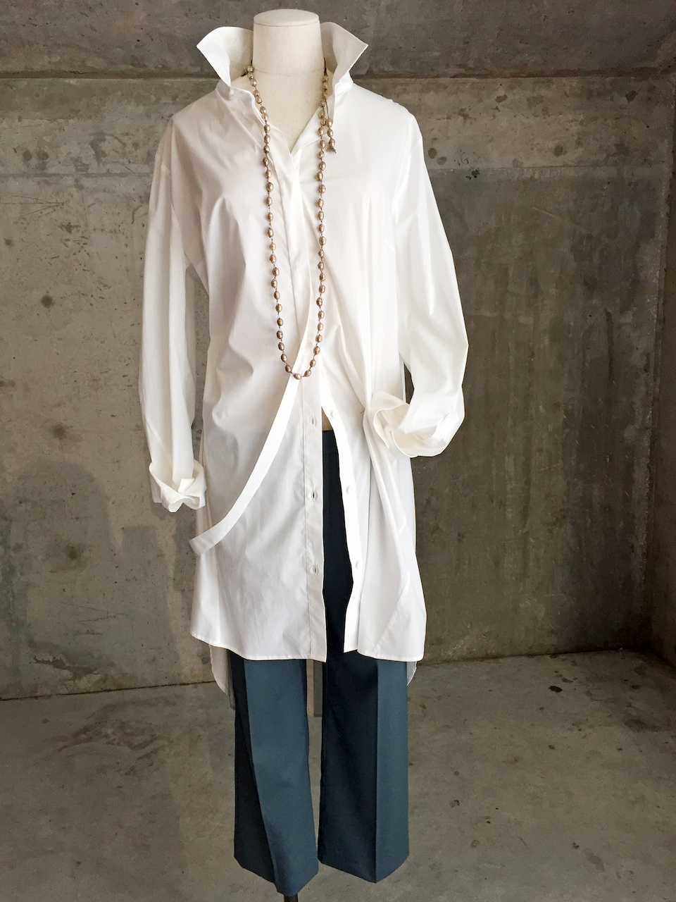 Create a modern look by leaving a few of the bottom buttons undone. Lilith, white blouse, What to Wear StyleBlueprint Atlanta