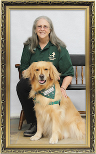 Margaret McCahill, B.S. '76, zoology, with her therapy dog Portia. Courtesy of Margaret McCahill. Frame photo: Michal Zacharzewski, freeimages.com.